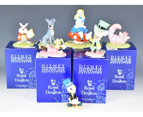 Royal Doulton seven Walt Disney Showcase&nbsp;figures&nbsp;comprising&nbsp;from Alice In Wonderland Alice, Cheshire Cat, Marc