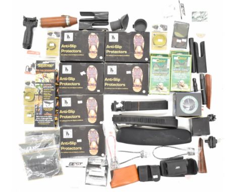 A collection of gun and shooting related items including Caldwell rifle rest bags, slings, forend covers, rifle holster, scop
