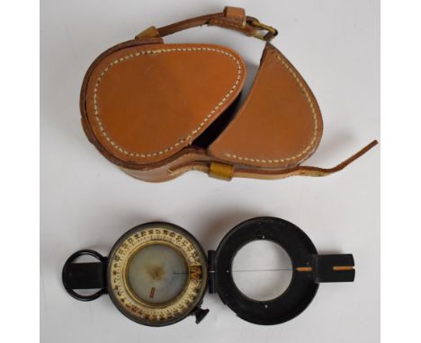British prismatic compass by Lawes Rabjohns Ltd, London, with leather case