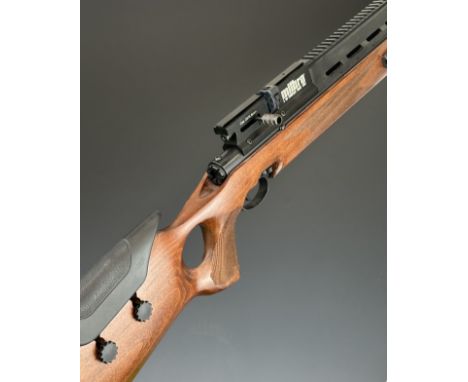 SMK Milbro Guardian .22 PCP air rifle with chequered thumb hole grip, adjustable comb, scope and bi-pod rails, two 8 shot mag