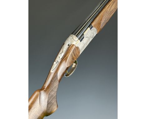 Beretta 687 SP III 12 bore over and under ejector shotgun with engraved scenes of birds to the locks, further engraving to th