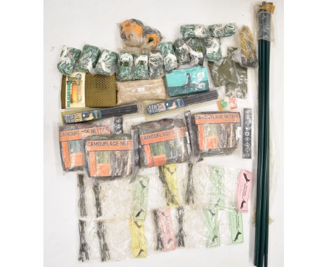 A collection of shooting and hunting related items, Caldwell shooting sticks, woodland camo, hide poles, ferreting/ rabbit pu