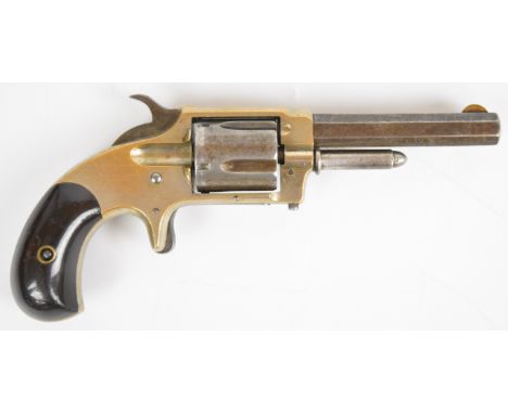 Whitney .32 five shot single action rimfire revolver with sheath trigger, shaped wooden grips and 3.25 inch octagonal barrel 