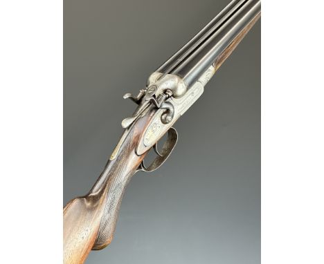 James Squires of London 12 bore side by side hammer action shotgun with engraved scenes of birds to the locks, engraved under