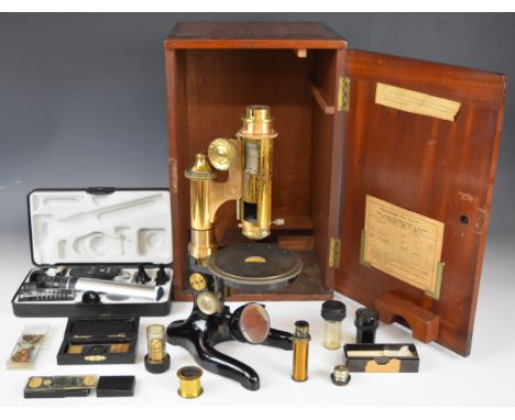 E.Leitz Wetzlar brass microscope, serial number 166232, with calibrated rotating stage, together with a quantity of eyepieces