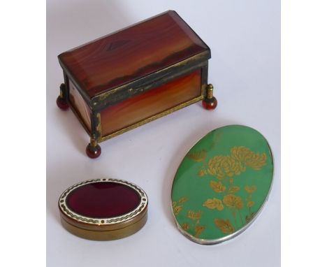 A bijouterie group to include a late 19th century gilt-metal mounted rectangular hardstone casket raised on four ball-style f