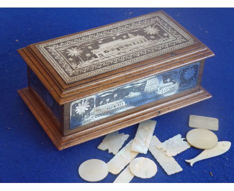 An early 20th century hardwood box, very finely silver inlaid with topographical scenes and a boat under a starry night and a