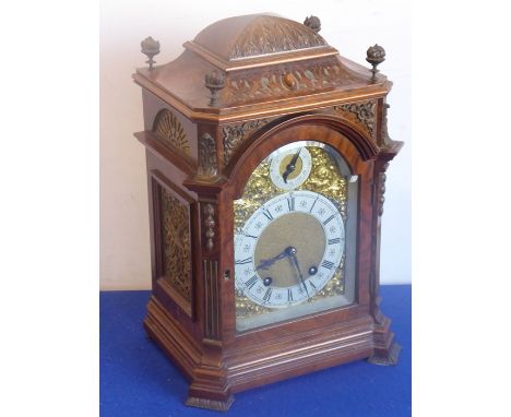 A fine late 19th century figured walnut cased eight-day bracket clock, the domed top carved with acanthus-style leaves above 