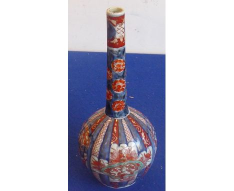 A late 19th century Japanese porcelain bottle vase hand decorated in the Imari palette, 32cm high&nbsp;