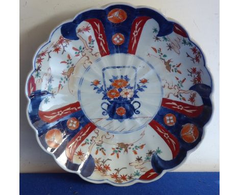 AMENDMENT - ITEM IS JAPANESE&nbsp; A late 19th century Chinese porcelain charger of flower-head shape and hand-decorated in e