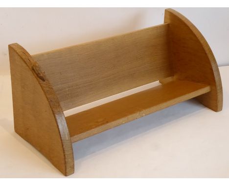 Robert 'Mouseman' Thompson of Kilburn, a tooled light-oak book stand with the signature mouse moving in a downward direction 