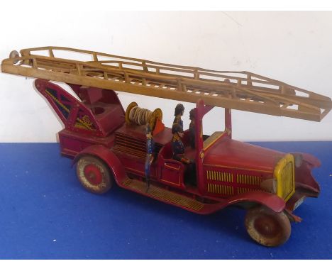 An early 20th century German tin-plate fire engine clockwork mechanism and raising extendable ladder, (in nearly&nbsp;origina