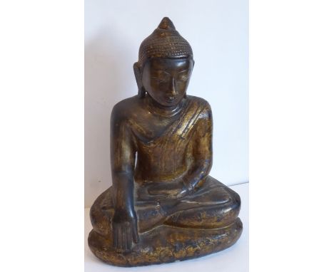 A Thai alabaster Buddha, 19th century, the figure cross legged wearing parcel-gilt robes and with knotted hair on a lotus bas