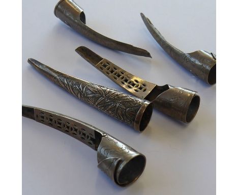 An interesting selection of Chinese Qing Dynasty fingernail guards to include silver-plated and metal examples variously deco