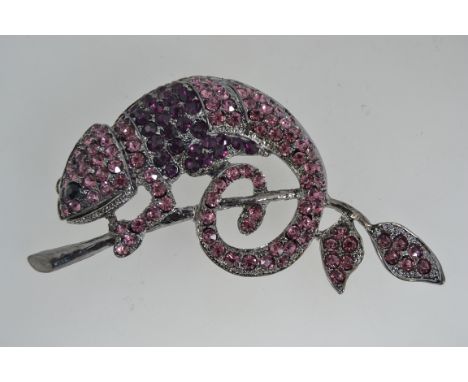 A huge grey metal figural brooch pin in the form of a chameleon with pink and purple set rhinestone stone decoration and roll