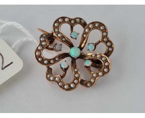 A opal and pearl antique daisy rose gold brooch 10ct