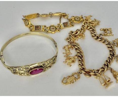 A silver vintage charm bracelet bangle etc.