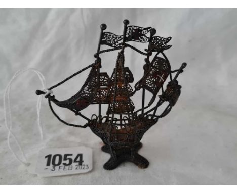 A silver filigree galleon with enamel flags, 3" high