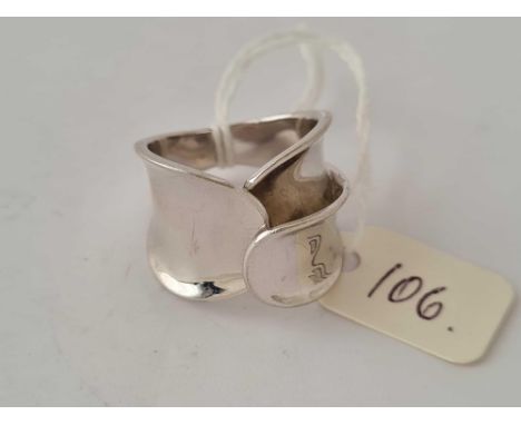 A designer silver ring size Q