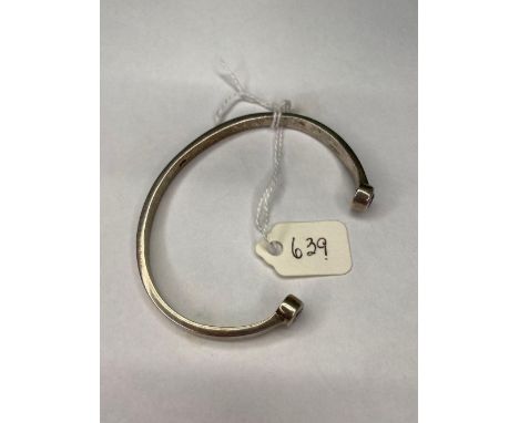 A amethyst set silver bangle 17.8 gms