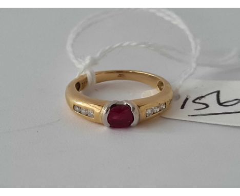 A ruby and diamond seven stone ring 18ct gold size I     2.8 gms