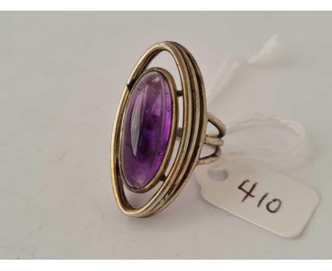 A large oval silver amethyst ring size N
