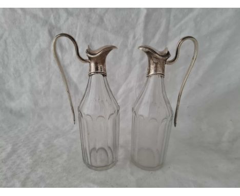 A pair of cruet bottles with Georgian silver mounts with glass bodies, 6.5" high by R Hennell