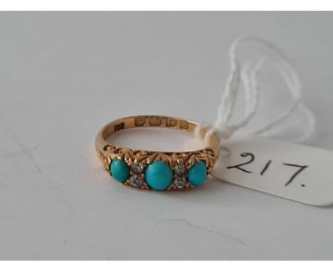 A SEVEN STONE TURQUOISE AND DIAMOND RING 18CT GOLD SIZE K   2.7 GMS