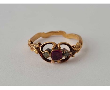 An early antique ruby ring with solid back to setting size L 2.1g inc