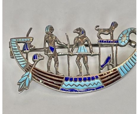 A unusual silver and enamel Egyptian brooch
