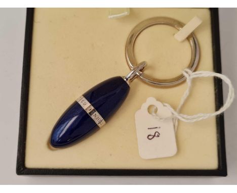 A cased DUNHILL key ring