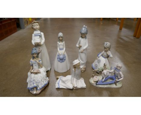 A collection of Nao and other similar figures (7), one a/f **PLEASE NOTE THIS LOT IS NOT ELIGIBLE FOR IN-HOUSE POSTING AND PA