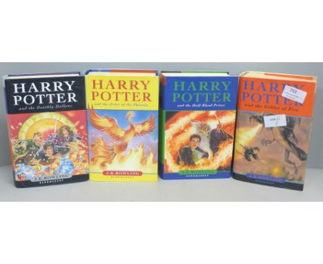 Four Harry Potter First Edition books 