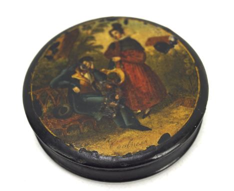 A 19th century papier snuff box, of circular form, the top with scene depicting a lady and gentleman in period dress, marked 