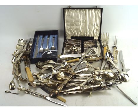 A selection of assorted silver plated and stainless flatware, to include spoons, knives and forks,