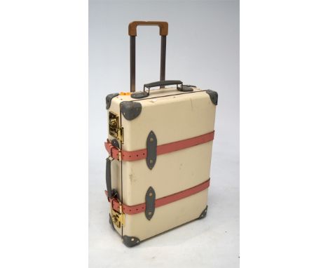 A Globe Trotter carry on two wheel suitcase, 55cm high