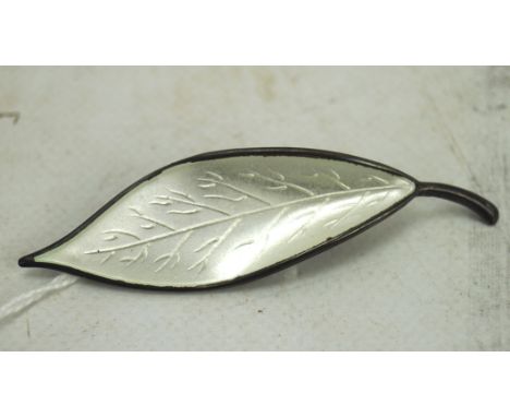 A David Anderson Norwegian sterling silver and white enamel leaf design brooch, 8.8g