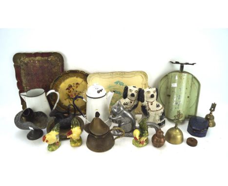 An assortment of collectables, to include a pair of Staffordshire dogs, squirrel nutcracker, enamel pouring jug and more