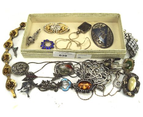 A collection of silver and white metal jewellery, comprising necklaces, brooches and a pendant, some set with stones, includi