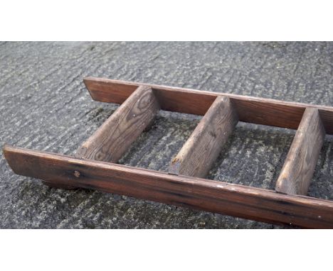 A large vintage wooden ladder, height 348cm