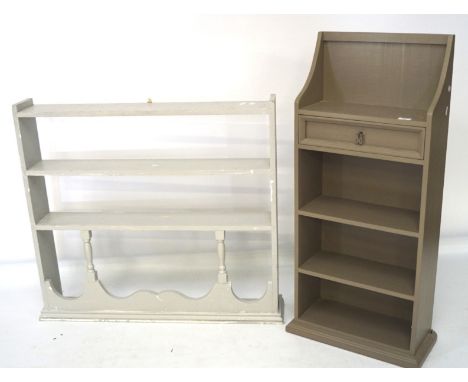 Two open frame painted bookcases, one with a drawer to the top, 106cm x 45cm x 19.5cm, the other with details to the bottom s