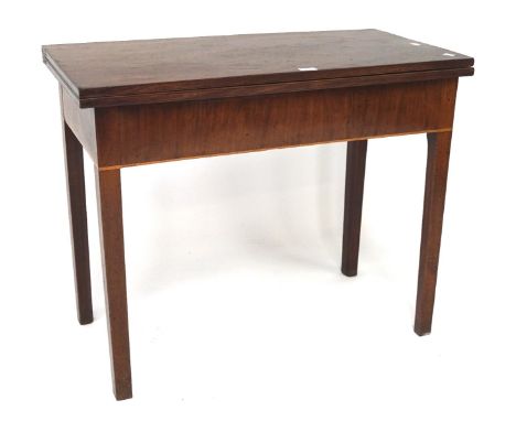 A 20th century mahogany card table, of rectangular form with curved corners, 73cm x 91cm x 90cm