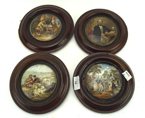 Four 20th century ceramic pot lids, of circular form, all with printed decoration, mounted in circular mahogany frames