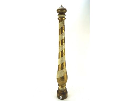 A large Italian wooden pepper grinder, decorated in a gilt and white swirling pattern, 81cm high