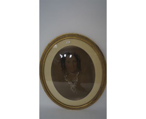 A large portrait sketch of a woman, of oval form, framed and glazed in gilt frame, 84cm x 71cm Condition Report: The glazed p