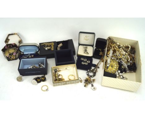 A collection of costume jewellery, including a necklace with a 9ct gold cross, pairs of cufflinks, pendant with a ceramic pan