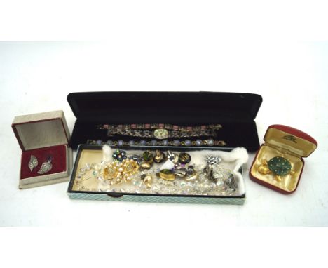 A small collection of costume jewellery, including earrings, bracelets, a tortoise brooch, ladies Rotary watch and more