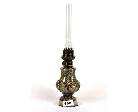 An attractive 19th century French silver plated oil lamp on an onyx base, H. 36cm.