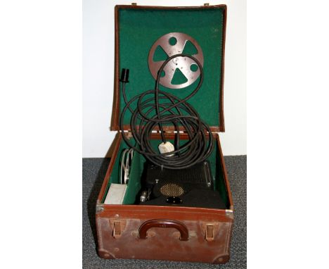 A cased vintage Specto cine-projector.