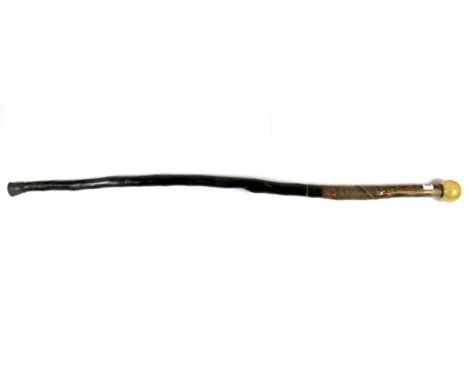 An interesting walking stick with compass inset into the handle.